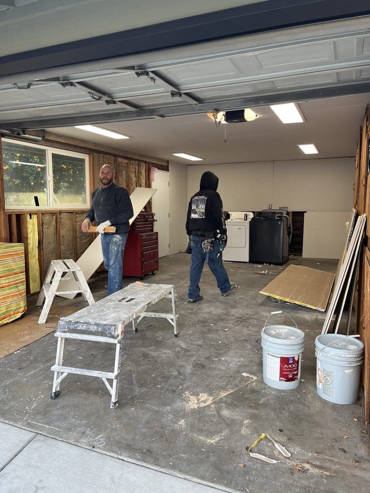 Mike putting up sheet rock